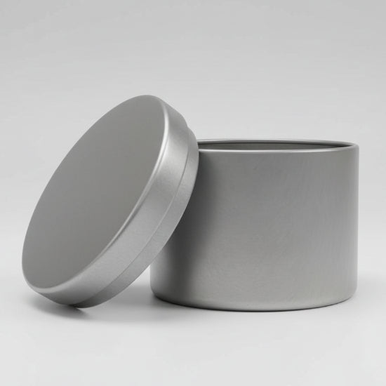 Candle tin on grey background