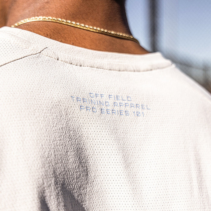 Bone and light blue Diamond Tech graphic tee — back view