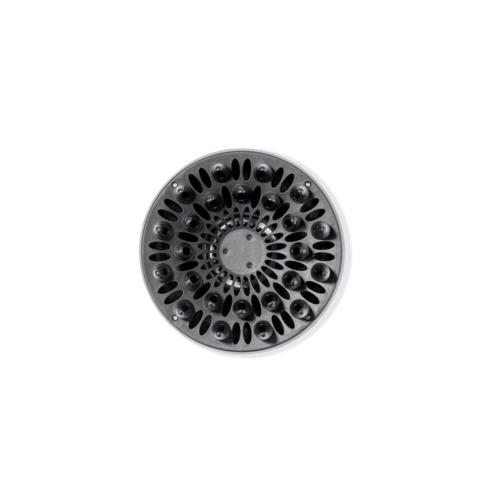 The vented side of the black Doux diffuser for Soleil is facing you so you can see the prongs.