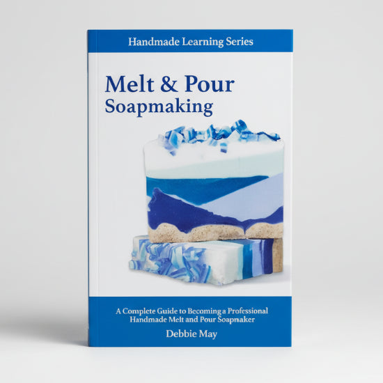 Book titled 'Melt & Pour Soapmaking' by Debbie May on a surface with a blurred background.