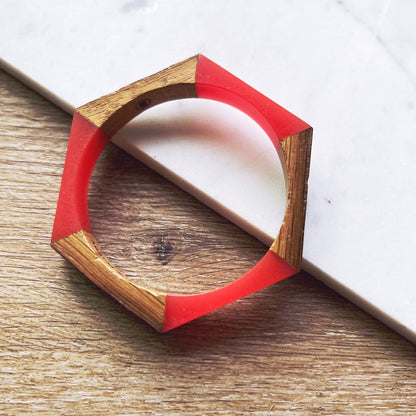 Olive and Poppy 1/2-inch barrel bracelet featuring smooth metal barrels and adjustable clasp on a neutral background.