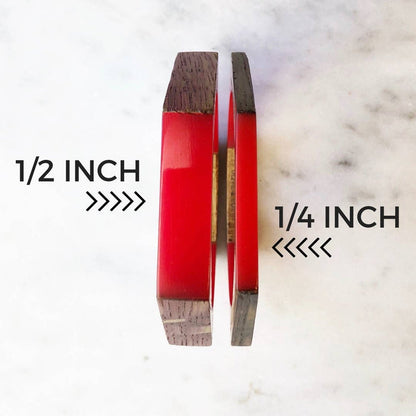 Olive and Poppy 1/2-inch barrel bracelet featuring sleek, cylindrical metal beads on a flexible bracelet band.