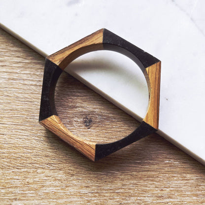 Olive and Poppy 1/2-inch barrel bracelet with textured metal design, showcasing a stylish and contemporary jewelry accessory.