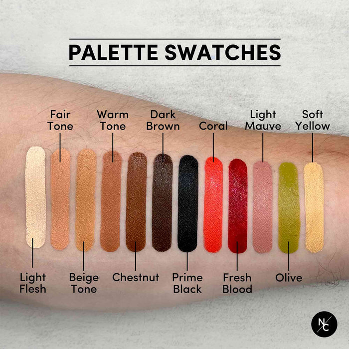 Palette swatches showing all 12 shades of the Tattoo Cover-Up Palette on skin