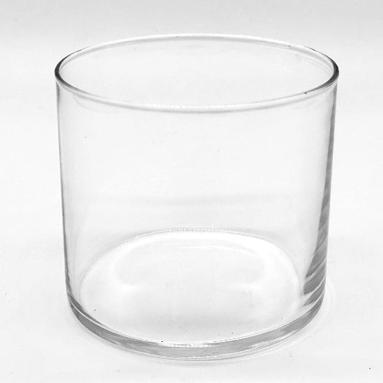 Clear glass candle holder on a white background