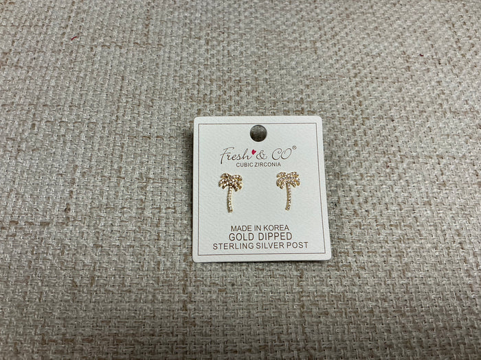 Small silver Tiny Palms earrings by SM Style featuring detailed palm tree designs on lightweight earrings.