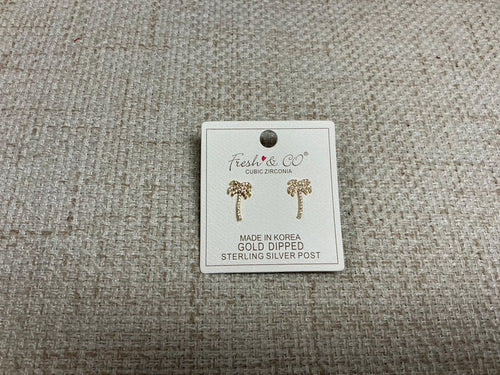 Small silver Tiny Palms earrings by SM Style featuring detailed palm tree designs on lightweight earrings.