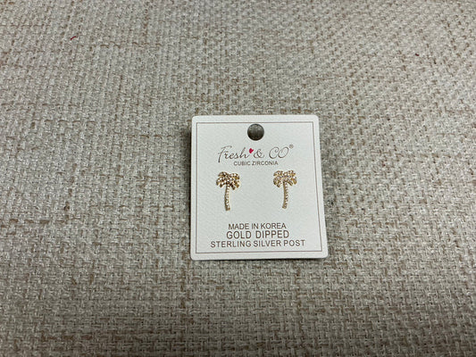 Small silver Tiny Palms earrings by SM Style featuring detailed palm tree designs on lightweight earrings.