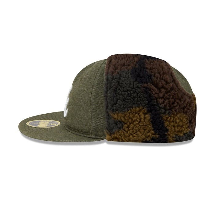 https://cdn.shopify.com/s/files/1/0601/2554/4675/files/60772909_RC59FIFTY_CAMODOGEAR595ORC_ATLBRA_XGR_LSIDE.jpg?v=1762457327