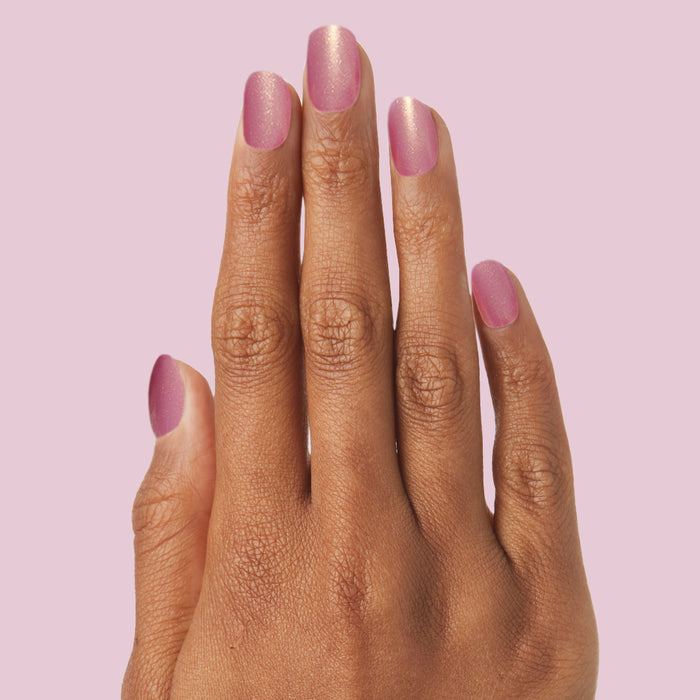 Baby Starfish | Round | Extra Short coral iridescent extra short round press-on nails for a shimmer manicure look