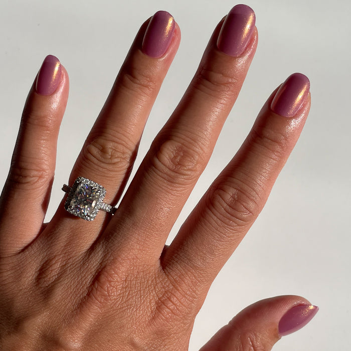 Baby Starfish | Round | Extra Short coral iridescent press-on nails in a round shape for a quick at-home manicure