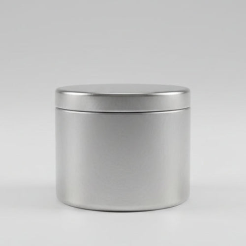 Candle tin on grey background