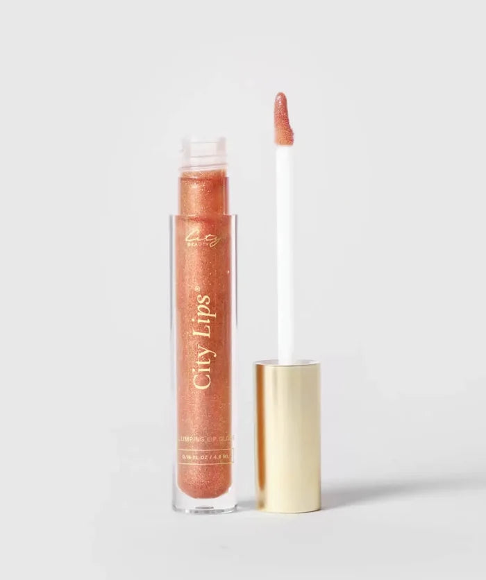 City Lips Sparkling Cider shimmer lipgloss from City Beauty featuring a sparkling, glossy finish on smooth lips.