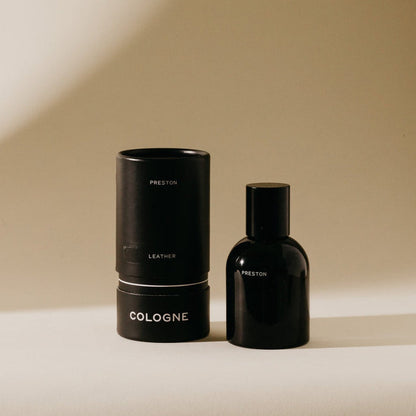 Cologne 1.7 oz set: black bottle and tube with Leather label