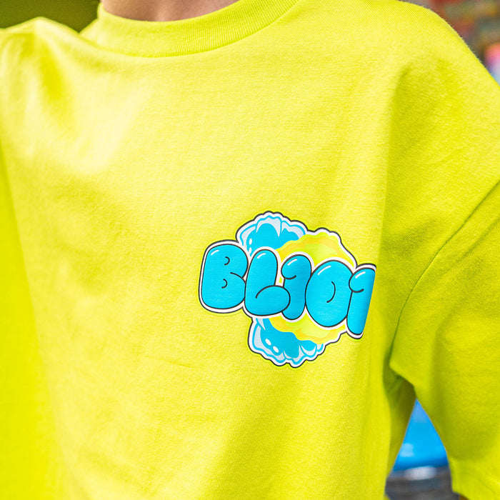 Yellow t-shirt with blue and yellow 'BL101' logo on a blurred background