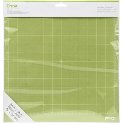 Cricut - Adhesive Back Cutting Mats 12"X12" - 3/Pkg - Green, Blue & Purple. Provo Craft-Cricut Adhesive Back Cutting Mats: Green, Blue And Purple. Each of the three mats has been customized to match the weight of commonly used crafting materials. Each has just the right level of grip to not only hold your material firmly in place during use but also allow you to easily remove the material from the adhesive surface. Available at Embellish Away located in Bowmanville Ontario Canada.
