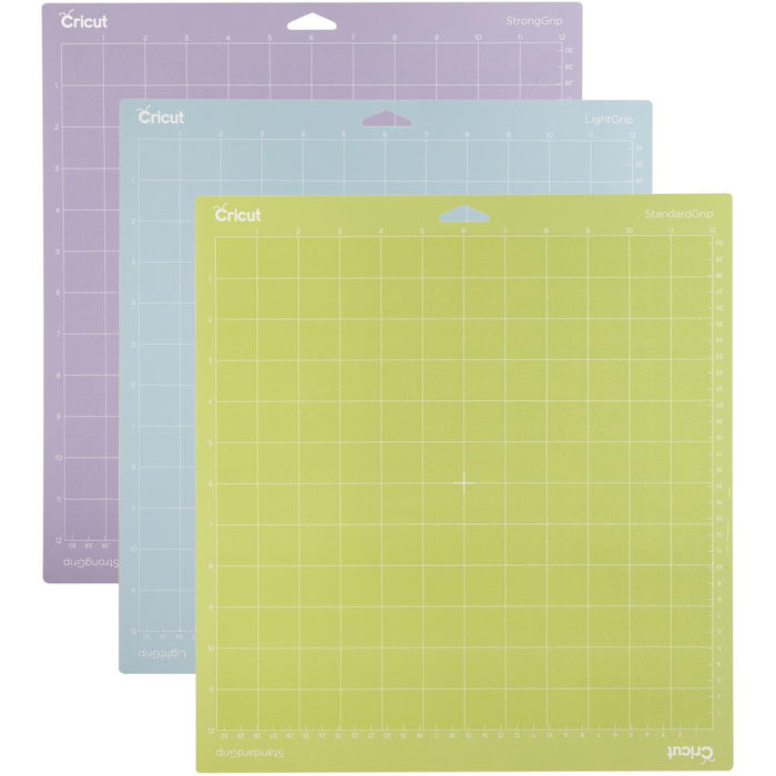 Cricut - Adhesive Back Cutting Mats 12"X12" - 3/Pkg - Green, Blue & Purple. Provo Craft-Cricut Adhesive Back Cutting Mats: Green, Blue And Purple. Each of the three mats has been customized to match the weight of commonly used crafting materials. Each has just the right level of grip to not only hold your material firmly in place during use but also allow you to easily remove the material from the adhesive surface. Available at Embellish Away located in Bowmanville Ontario Canada.