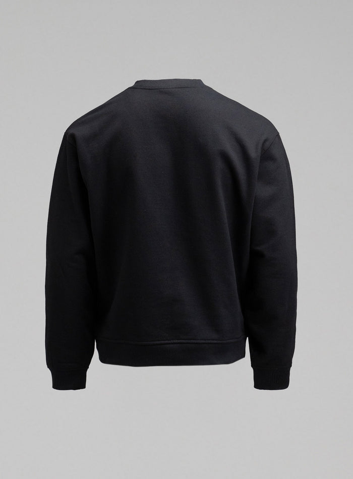 Hem Cut Out Image of Dissident Jumper In Obsidian Black (GM)