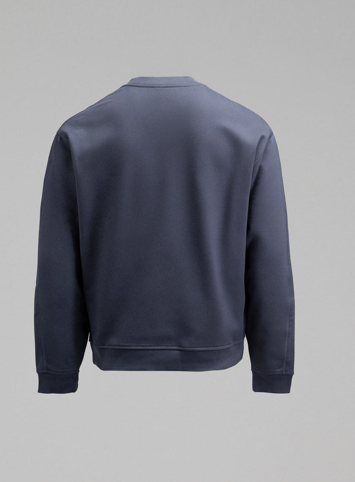 Hem Cut Out Image of Dissident Jumper In Storm Blue (GM)