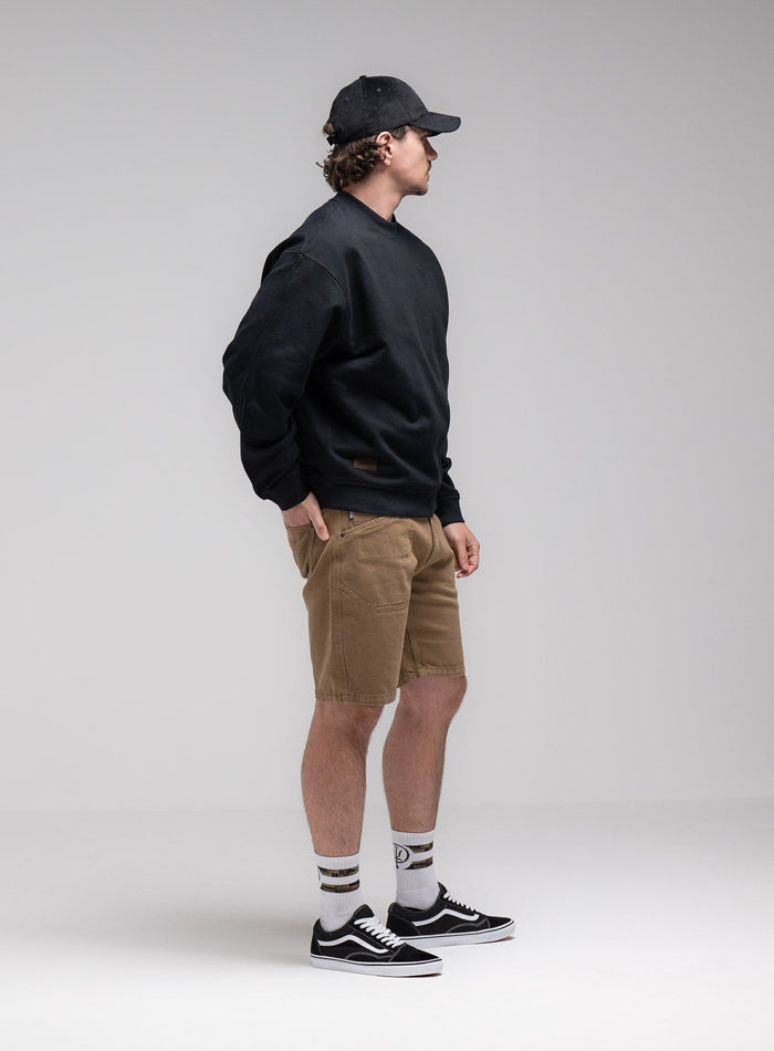 Jack Is 6ft 3" And Wears Size: L | Hem Studio Image Of Model Wearing Dissident Jumper In Obsidian Black (SS Model)