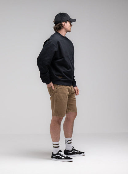Jack Is 6ft 3" And Wears Size: L | Hem Studio Image Of Model Wearing Dissident Jumper In Obsidian Black (SS Model)