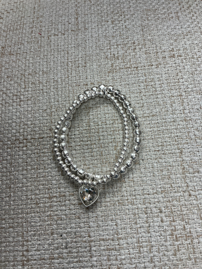 Double My Love bracelet by American Unique Group showing silver-toned metal with intertwined heart charms.