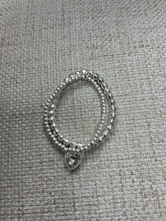 Double My Love bracelet by American Unique Group showing silver-toned metal with intertwined heart charms.