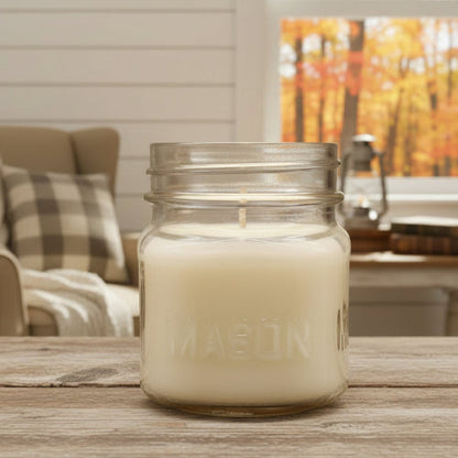 Clear glass mason jar on a white background