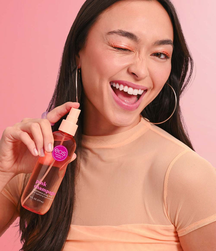 model spraying body spray