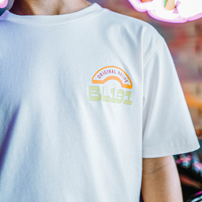 White t-shirt with 'Original Recipe BL101' text on a blurred background