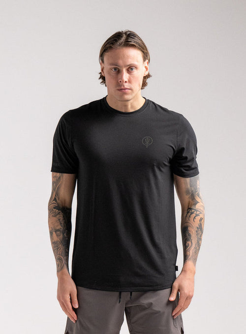 Angus Is 6ft 4" And Wears Size: L | Hem Studio Image Of Model Wearing Force Active Drirelease® Tshirt In Black (SS Model)