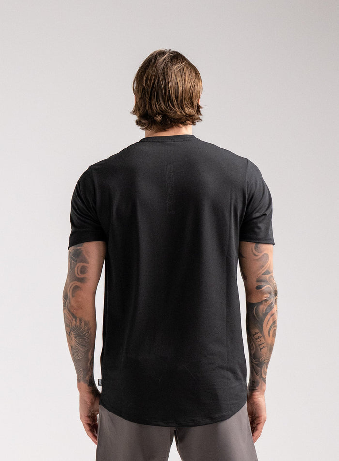 Angus Is 6ft 4" And Wears Size: L | Hem Studio Image Of Model Wearing Force Active Drirelease® Tshirt In Black (SS Model)