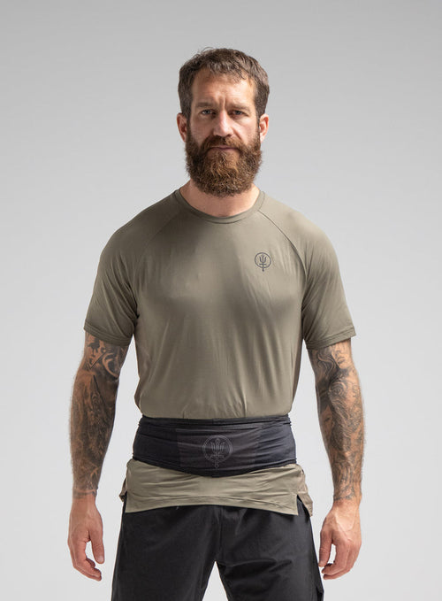 Louis Is 5ft 10" And Wears Size: M | Hem Studio Image Of Model Wearing Force Running Belt In Obsidian Black (SS Model)