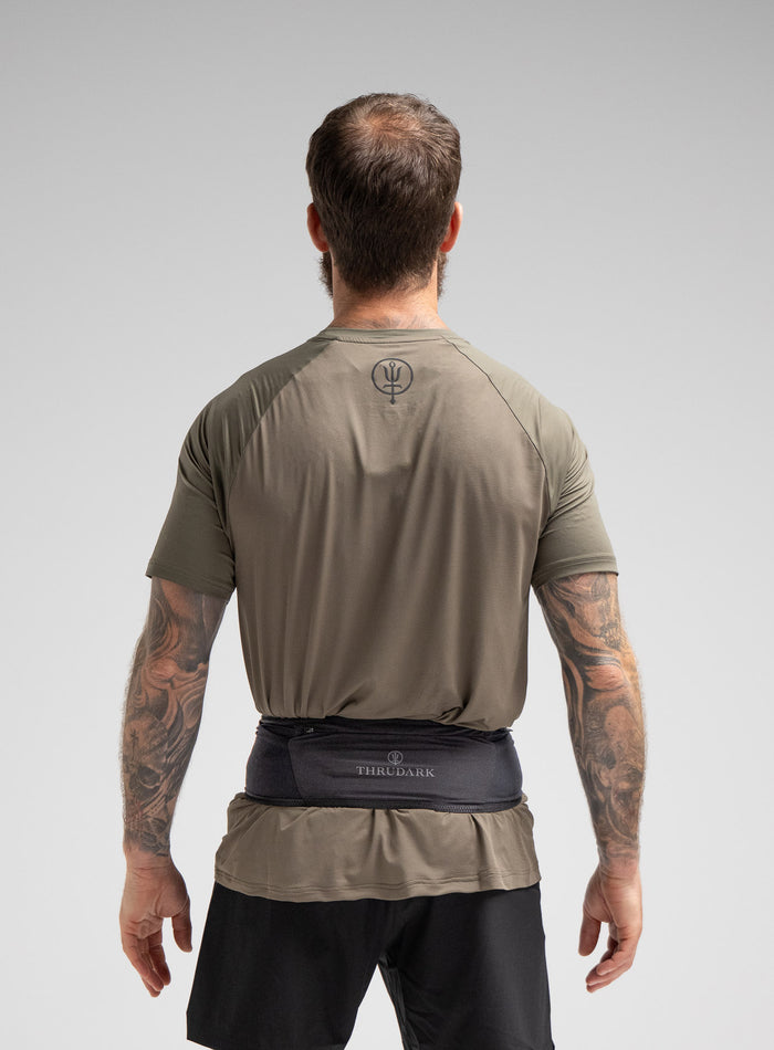Louis Is 5ft 10" And Wears Size: M | Hem Studio Image Of Model Wearing Force Running Belt In Obsidian Black (SS Model)