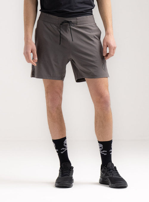 Rudie Is 6ft 2" And Wears Size: M | Hem Studio Image Of Model Wearing Force Velocity Motion Shorts In Raven Grey (SS Model)