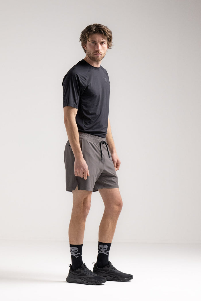 Rudie Is 6ft 2" And Wears Size: M | Hem Studio Image Of Model Wearing Force Velocity Motion Shorts In Raven Grey (SS Model)