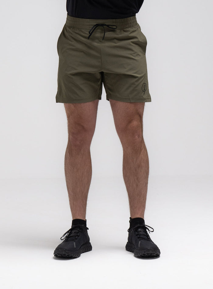 Jack Is 6ft 3" And Wears Size: L | Hem Studio Image Of Model Wearing Force Velocity Motion Shorts In Khaki (SS Model)