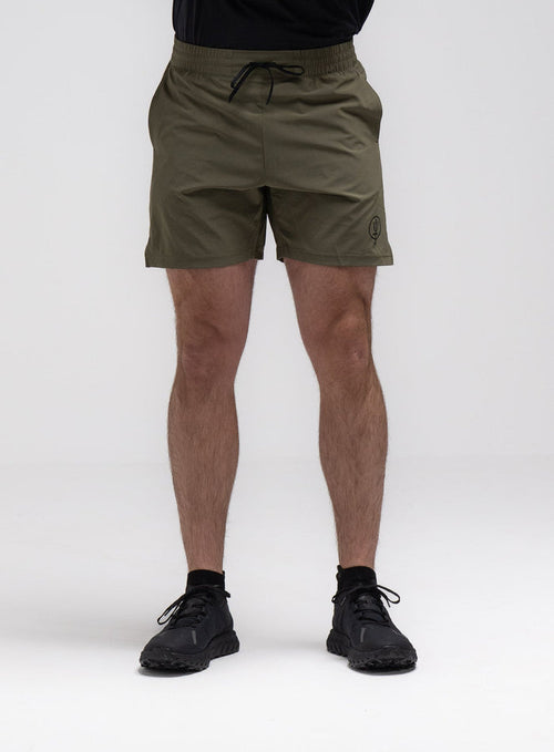 Jack Is 6ft 3" And Wears Size: L | Hem Studio Image Of Model Wearing Force Velocity Motion Shorts In Khaki (SS Model)