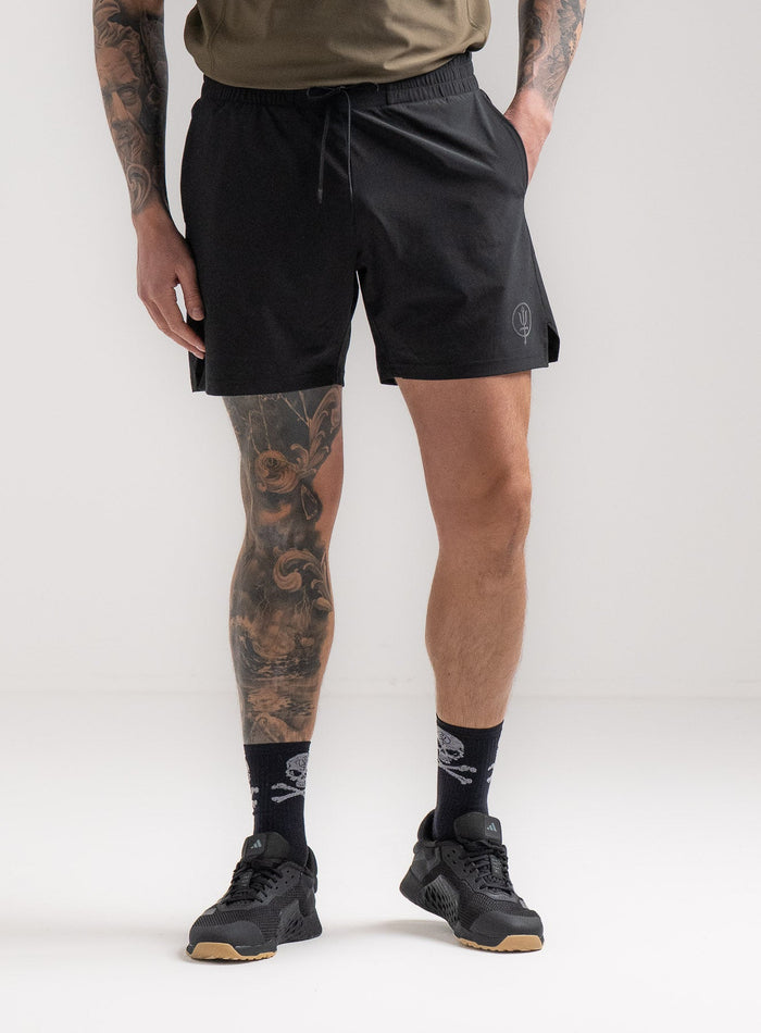 Angus Is 6ft 4" And Wears Size: L | Hem Studio Image Of Model Wearing Force Velocity Motion Shorts In Obsidian Black (SS Model)