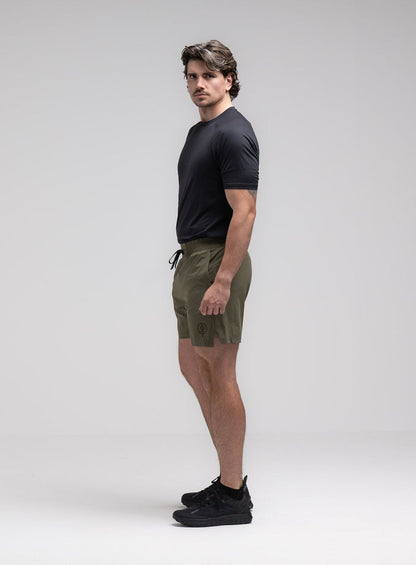 Jack Is 6ft 3" And Wears Size: L | Hem Studio Image Of Model Wearing Force Velocity Motion Shorts In Khaki (SS Model)