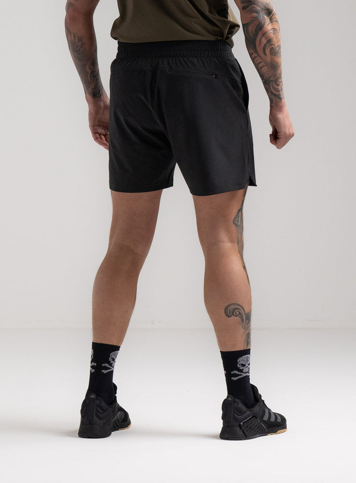 Angus Is 6ft 4" And Wears Size: L | Hem Studio Image Of Model Wearing Force Velocity Motion Shorts In Obsidian Black (SS Model)