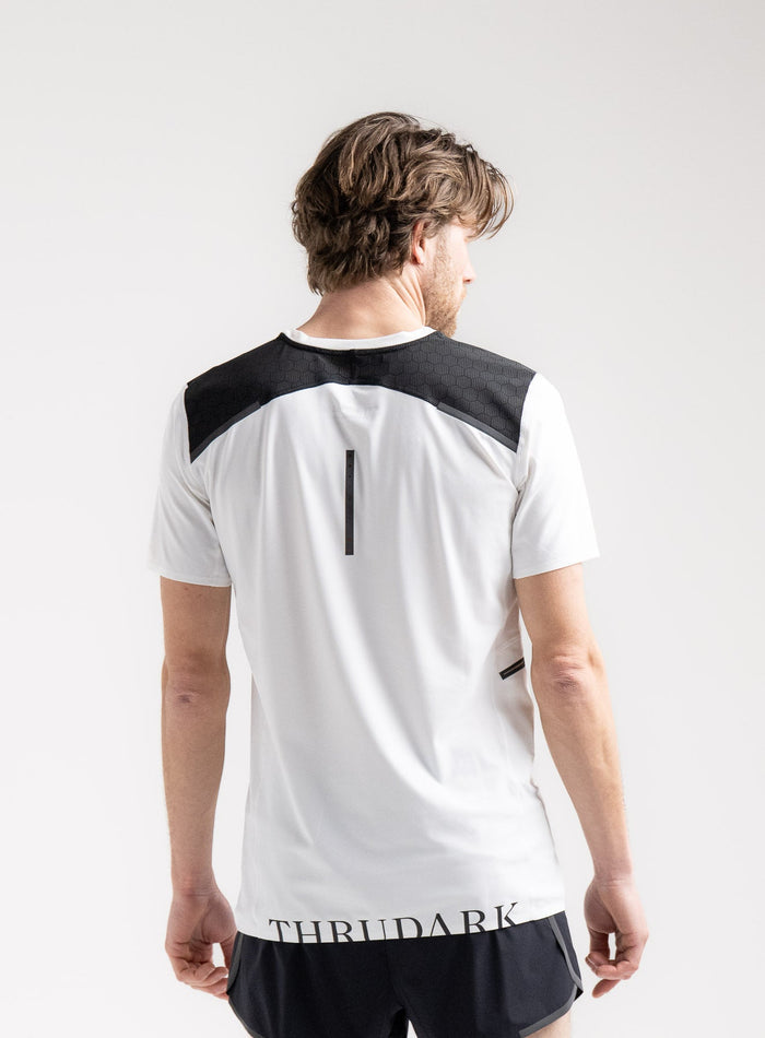Rudie Is 6ft 2" And Wears Size: M | Hem Studio Image Of Model Wearing Force Velocity Technical T-Shirt In Optic White (SS Model)