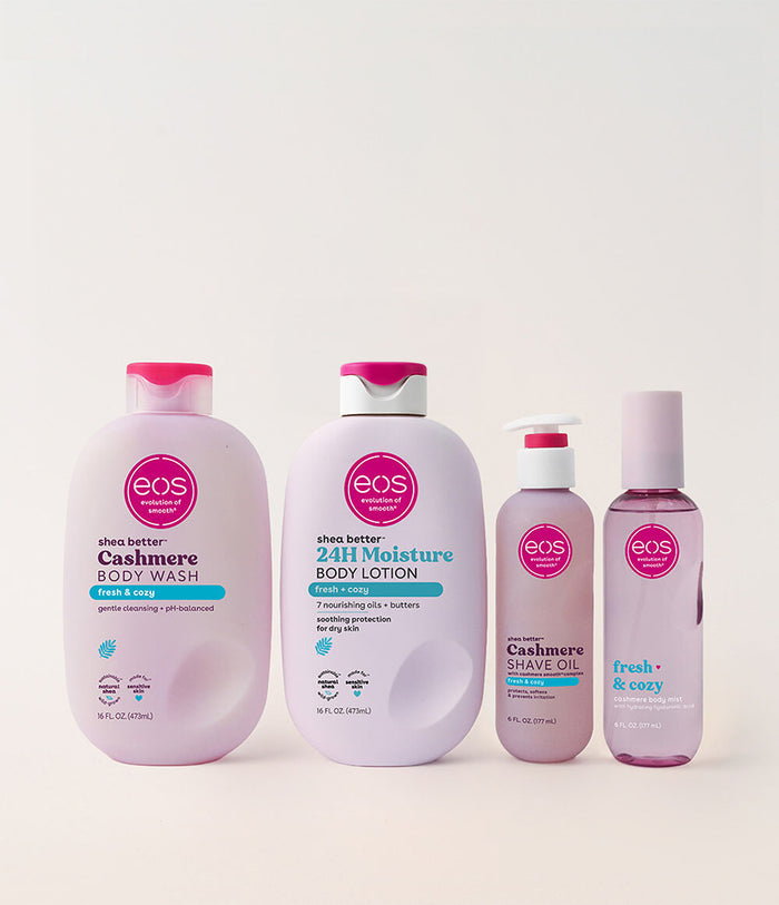 Set of eos skincare products including body wash, lotion, and shave oil on a light background