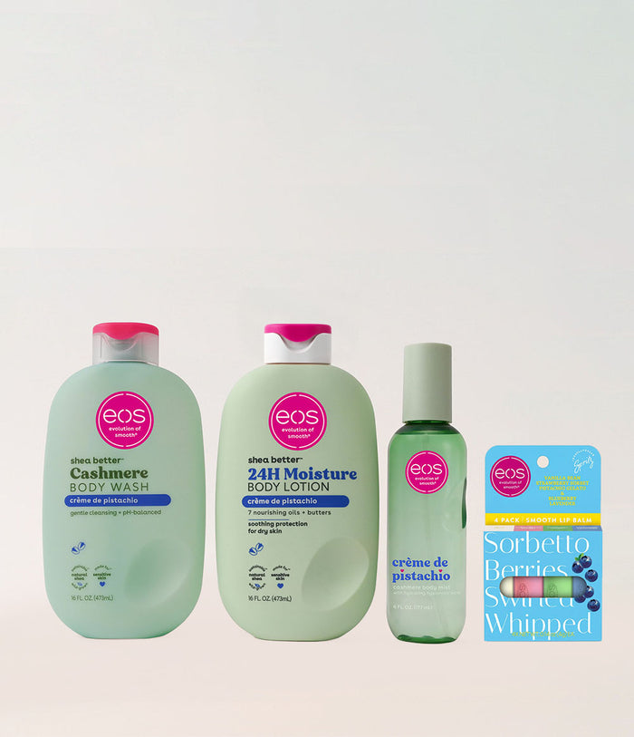 Collection of EOS products including body wash, lotion, and lip balm on a light gray background