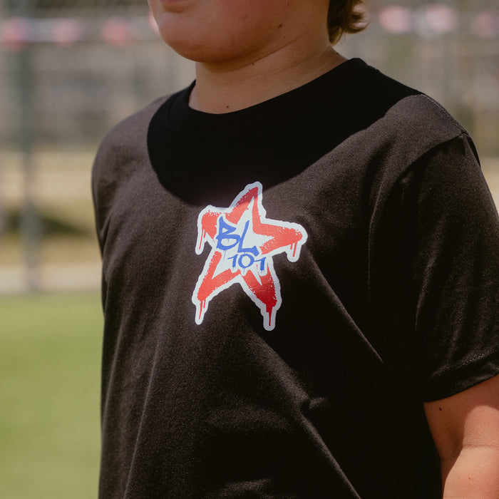 Adult model wearing black Graffiti Stars USA graphic tee