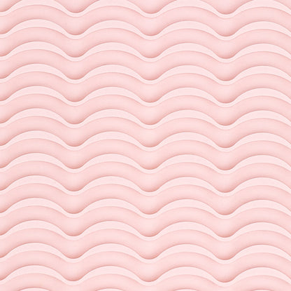 It shows a close-up of the silicone rippled surface of the styling tool heat-resistant mat.