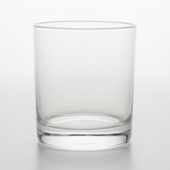 Clear glass tumbler on a white background