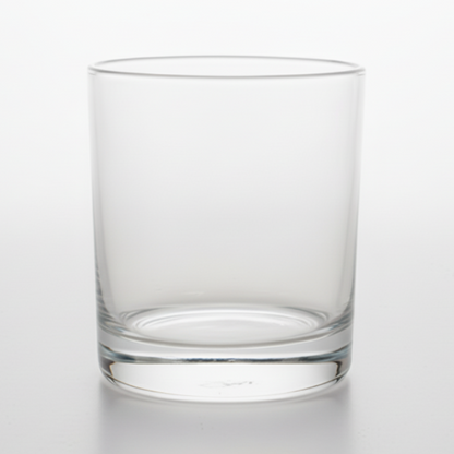 Clear glass tumbler on a white background