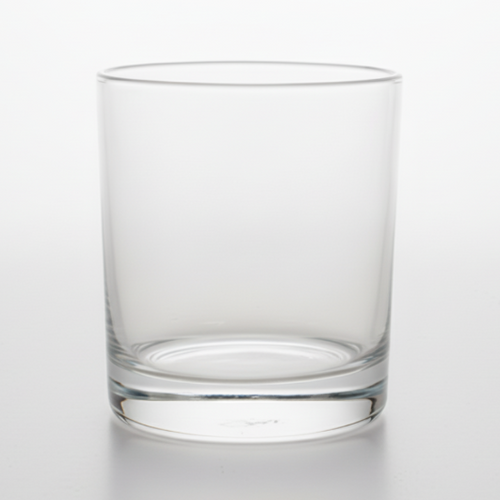 Clear glass tumbler on a white background