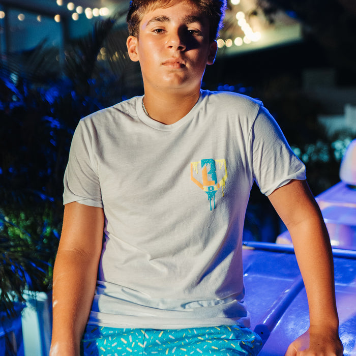 Youth model wearing white Ice Cream Blueberry Lemonade youth graphic tee